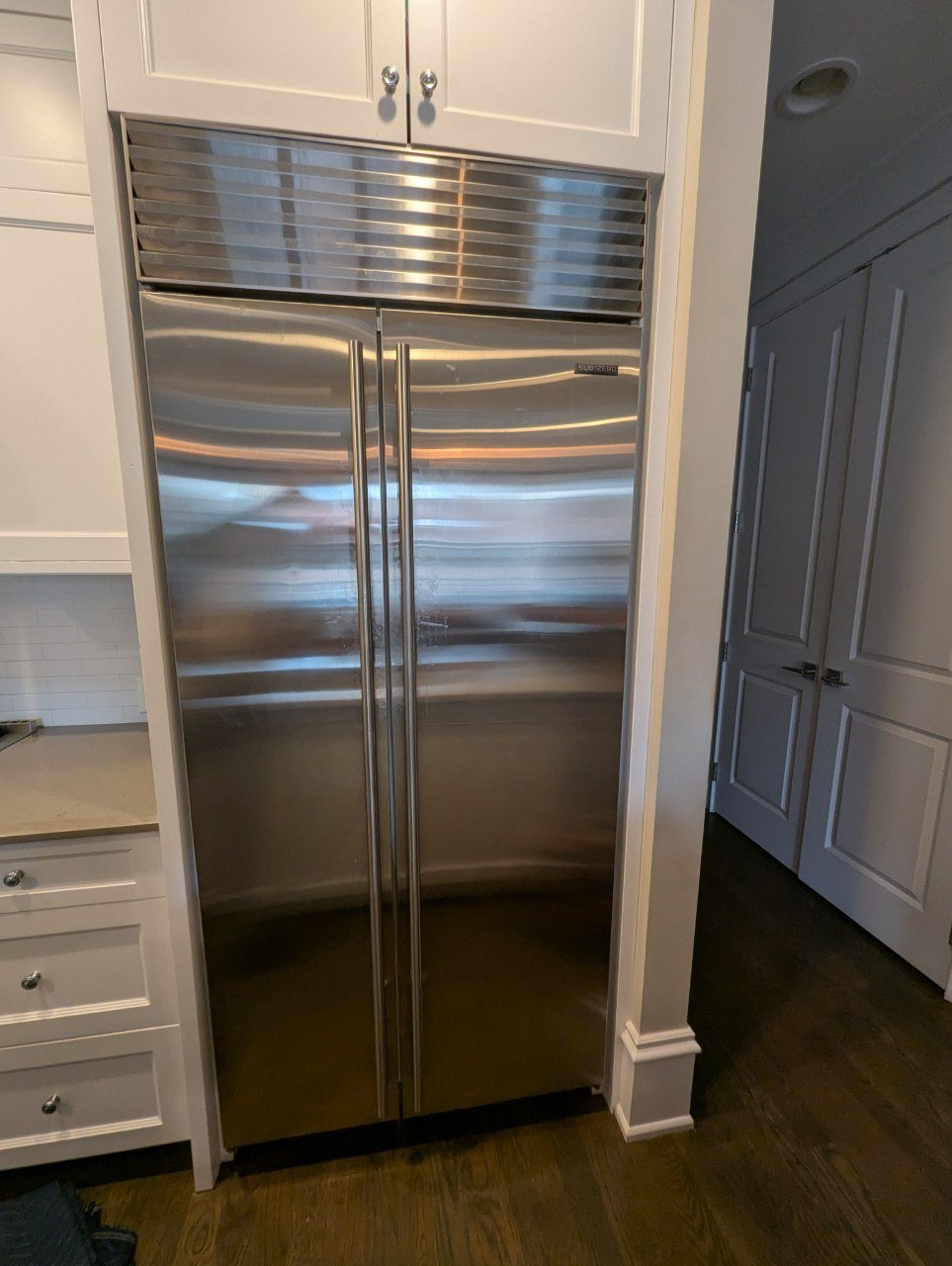 Sub-Zero built-in side-by-side refrigerator serviced by SAVA in Chicago modern kitchen