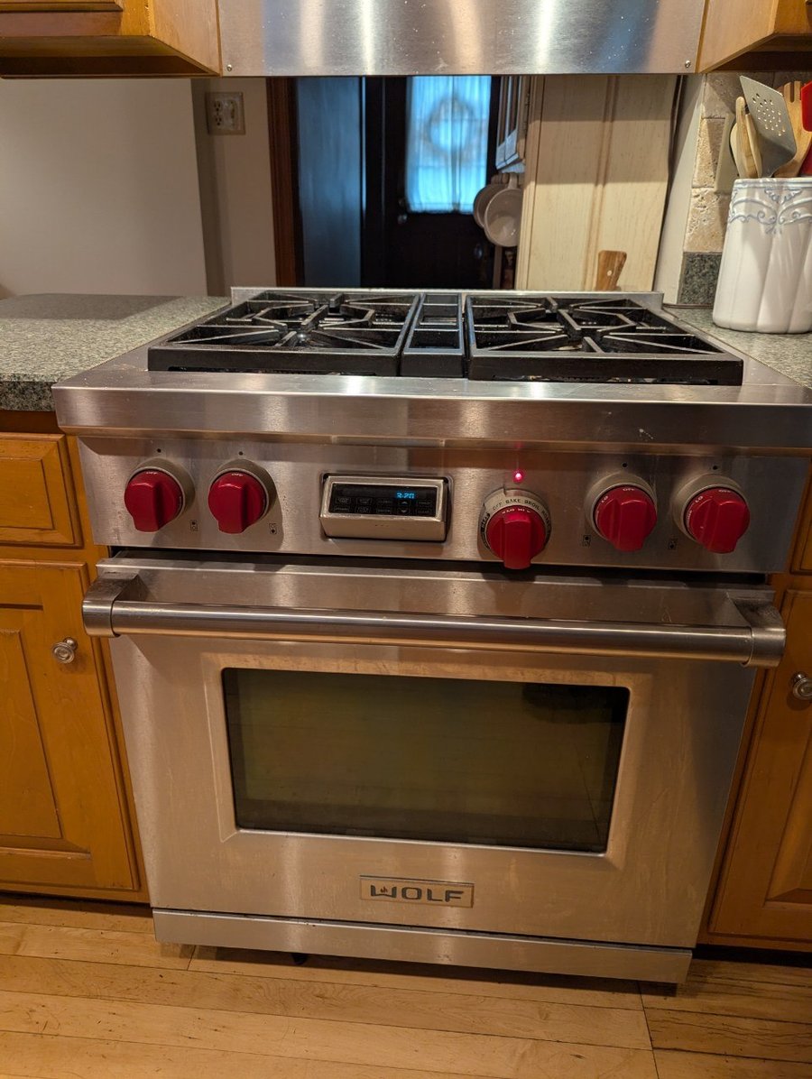 Wolf burner and cooktop component during SAVA diagnostic service